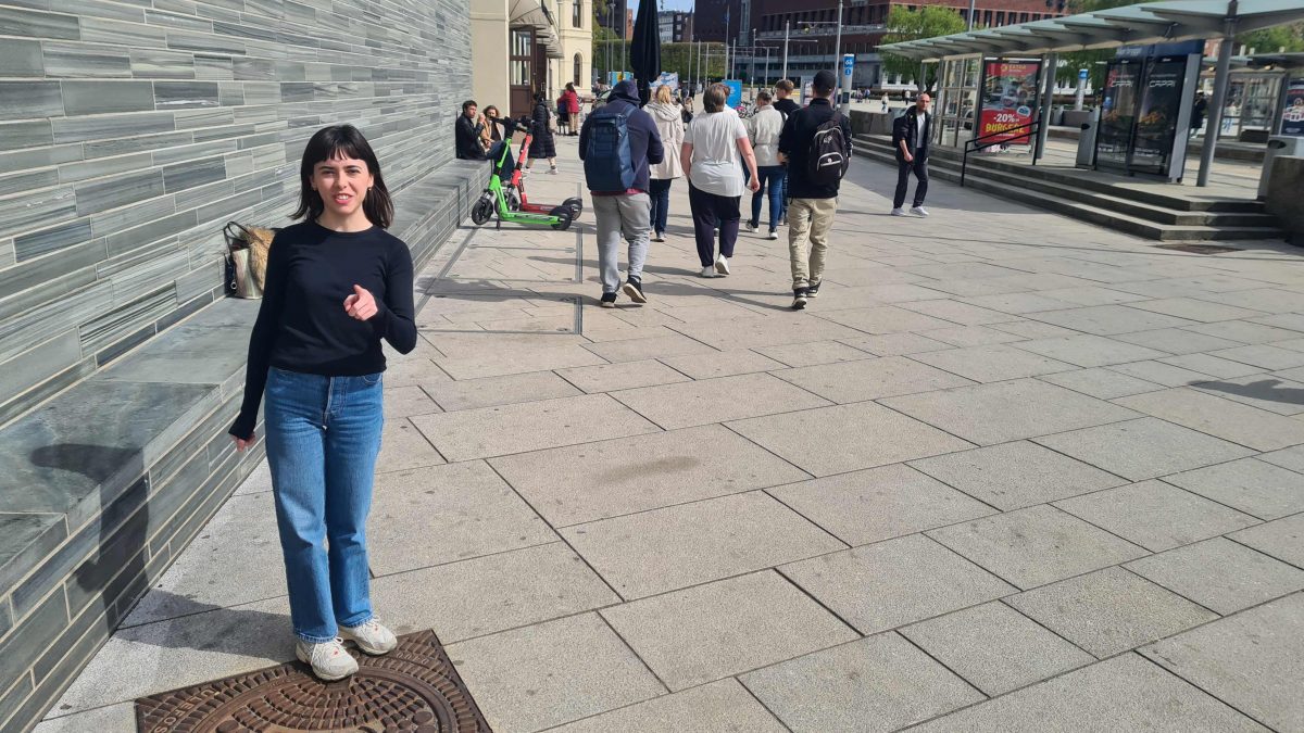 People-watching by-passers at Oslo's Aker Brygge.